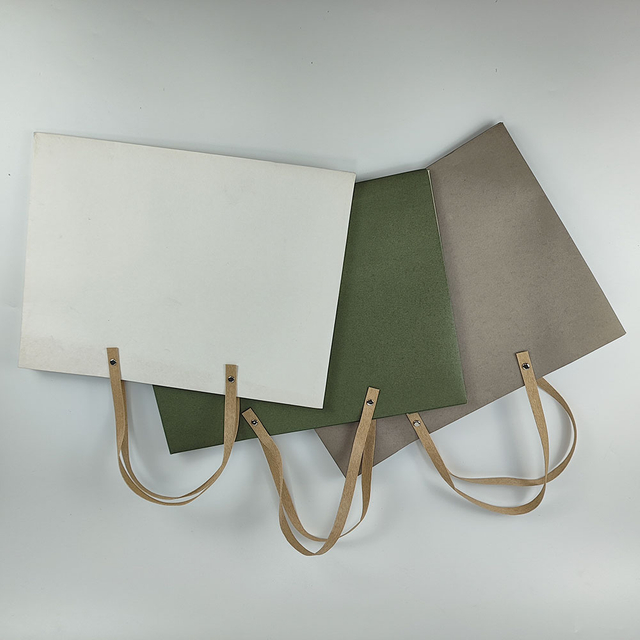 Wholesale paper bag packaging with handles